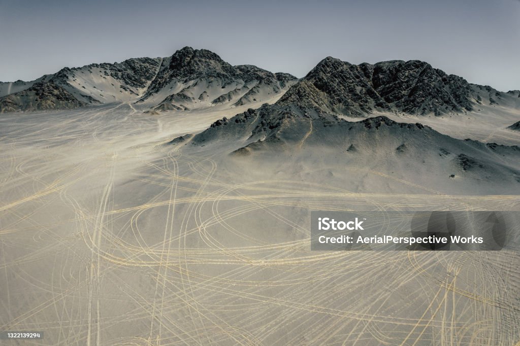 Aerial View of Moutains and Tire Traces / Qinghai, China Desert Area Stock Photo