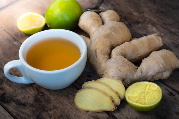 istock A cup of ginger tea and Fresh ginger root on rustic wooden background 1322141610