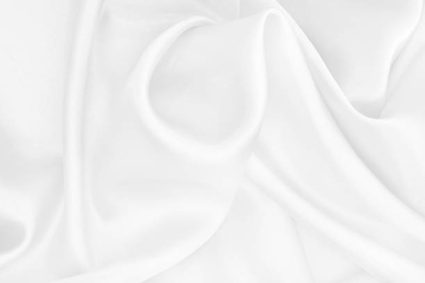 istock White fabric texture background, detail of silk or linen pattern. 1322141879