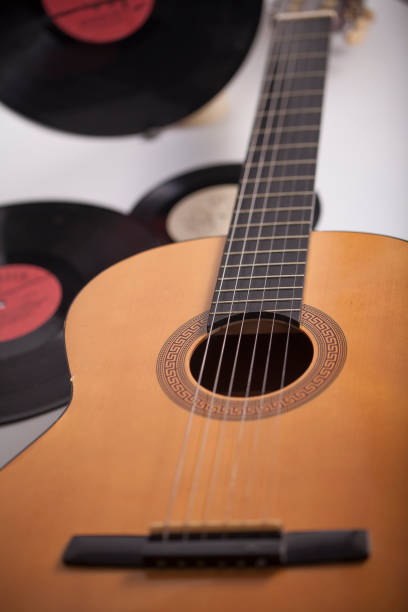istock Music background, guitar and old vinyl records 1322142072