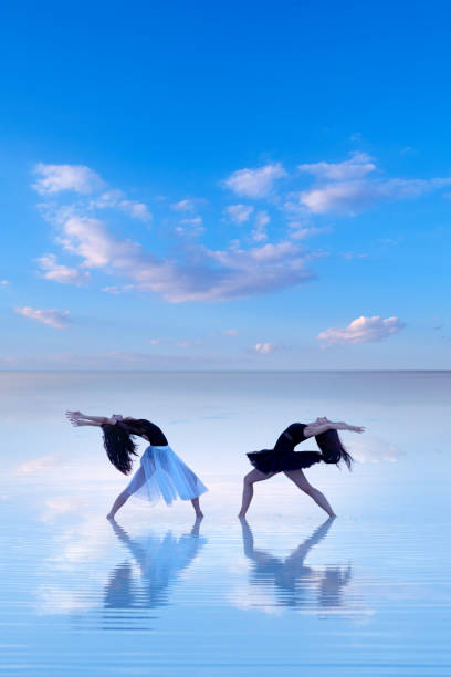 istock Beautiful dancers, dancing on the lake 1322143237