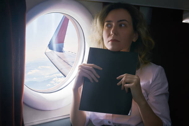woman being an airplane passenger experiences aerophobia