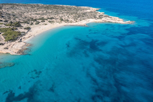istock Greece, Koufonisi island, sandy beach, aerial drone view 1322146426