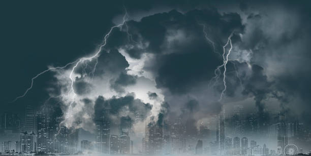 istock Thunderstorm clouds with lightning storm over city background - lightning storm on dark background 1322151349