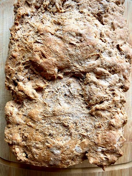istock Overhead view of Farmhouse bread on counter. 1322154162