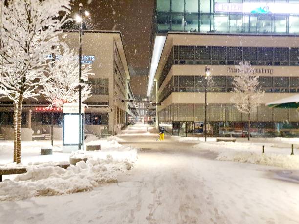 Sihlcity is a shopping mall located in Zürich which was built on the ground of a former paper mill near the Sihl river. The mall was opened on March 22, 2007. Architect where Theo Hotz and the Costs for the realization was 620 m CHF. The Image shows Sihlcity during winter season while snowfall in the night.