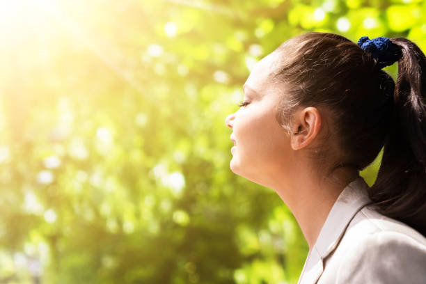 istock Woman Breathing Clean Air 1322155172