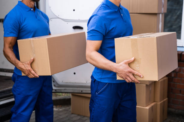 Truck Movers Loading Van Carrying Boxes stock photo