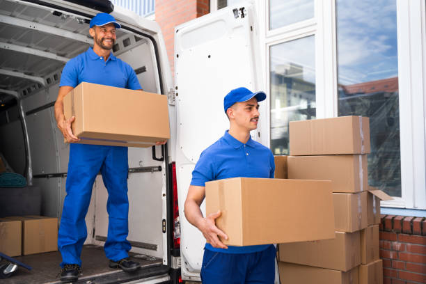 Truck Movers Loading Van Carrying Boxes stock photo