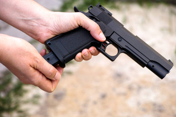 istock A person reloading an airsoft gun 1322156783