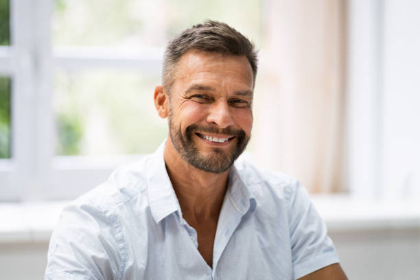 istock Smiling Young Man Portrait At Workplace 1322156974