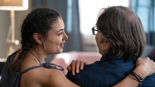 istock Daughter hugs his own father 1322157017
