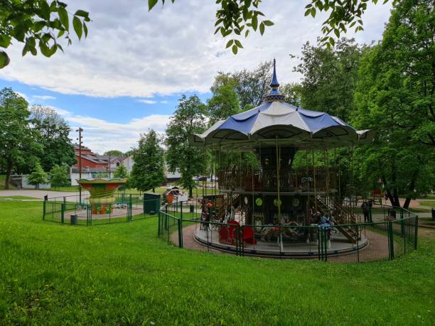 istock Children's carousel in the park. Carousel rides. 1322168626