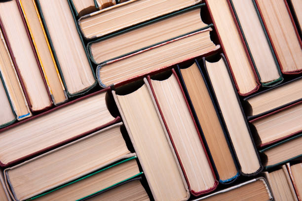 istock Old books as background. Stack of hardcover books, top view. Education and learning concept 1322173243