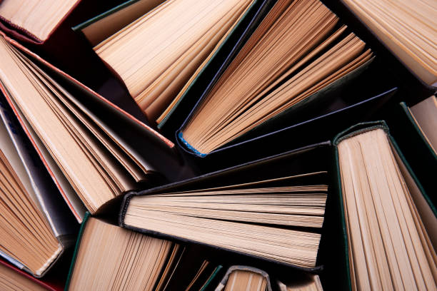 istock Old books as background. Stack of hardcover books, top view. Education and learning concept 1322173248