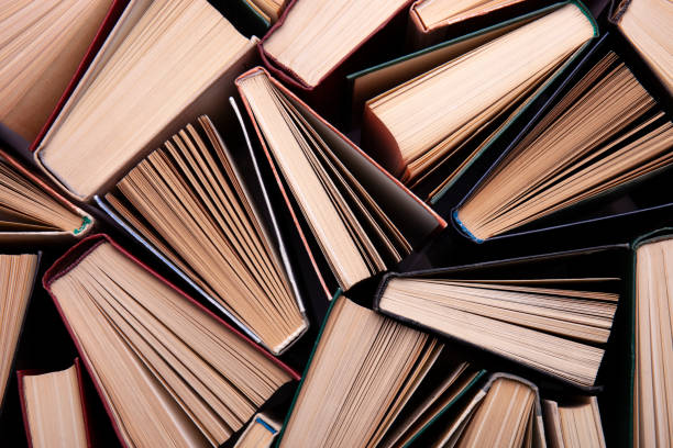 istock Old books as background. Stack of hardcover books, top view. Education and learning concept 1322173276