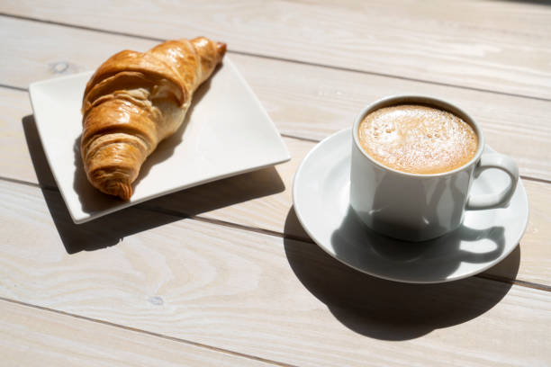 istock Coffee and croissant 1322175087
