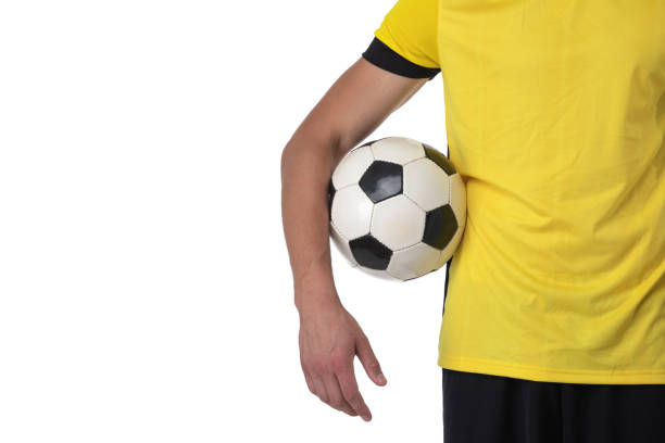 istock Soccer player holding a ball 1322175145