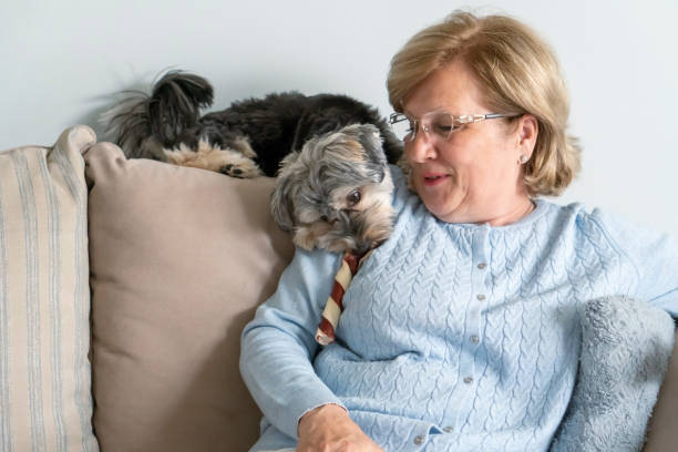 istock Senior woman with her little dog 1322176199