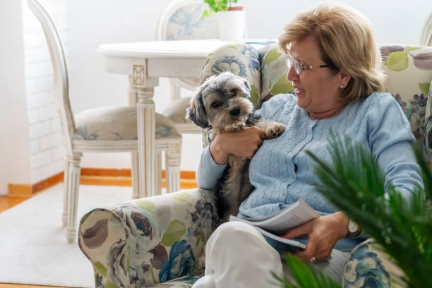istock Senior woman with her little dog 1322176232