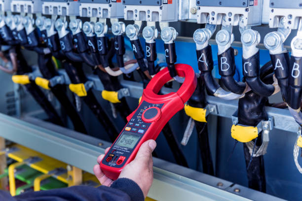 istock Checking the operating voltage levels of the solar panel switchgear compartment 1322180153