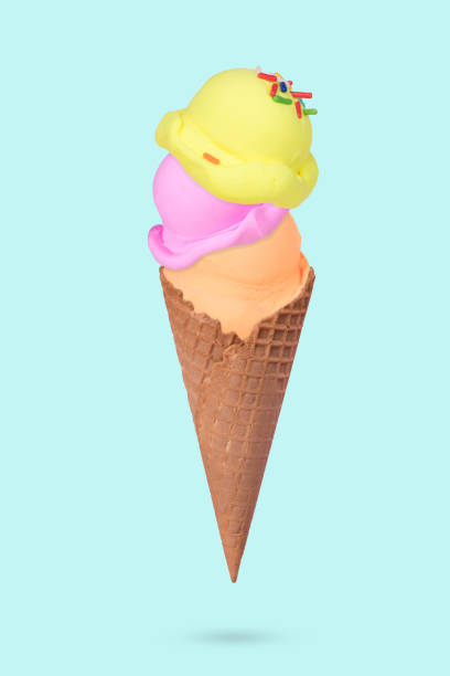 istock Ice cream cone with  colorful ice cream scoops on pastel blue background 1322180378
