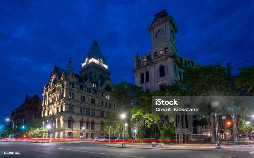 Syracuse New York downtown at dusk Salina Street, Syracuse NY. Syracuse Savings Bank Building and Gridley Building. New York State Stock Photo