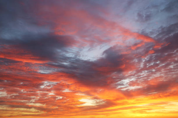 istock Sunset on colorful sky with red and orange clouds 1322186969
