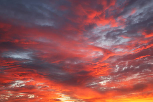 istock Sunset on colorful dramatic sky with red clouds 1322187325