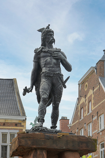 Tongeren, Limburg - Belgium - 06.06.2021. Statue of Ambiorix in Tongeren. A statue of the Belgian tribal leader Ambiorix, who in 54-53 BC challenged the Roman Empire in battle. Sculptor Jules Bertin
