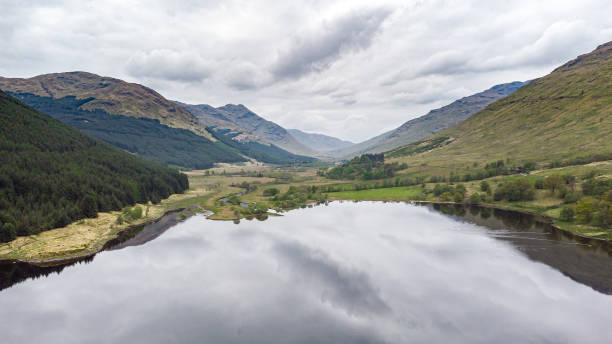 Aerial of Loch Doine Loch Doine in a remote valley in the Scottish Highlands loch voil stock pictures, royalty-free photos & images