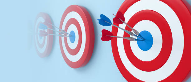 istock Panoramic dart hitting target on blue background. Bullseye success concept. 1322192259