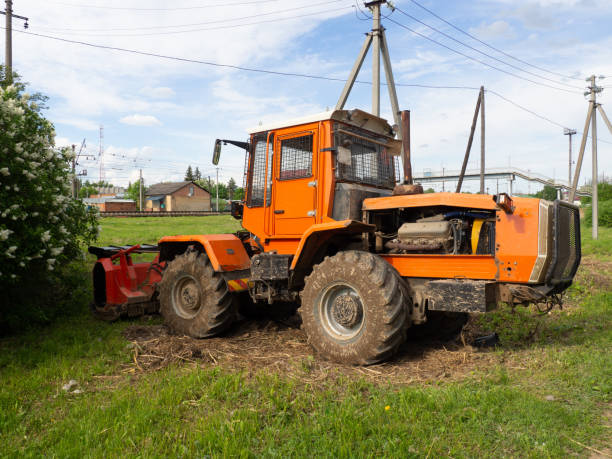istock Wheel loader. Yellow front loader. Front-end loader of the tractor. Heavy Equipment Machine 1322192394