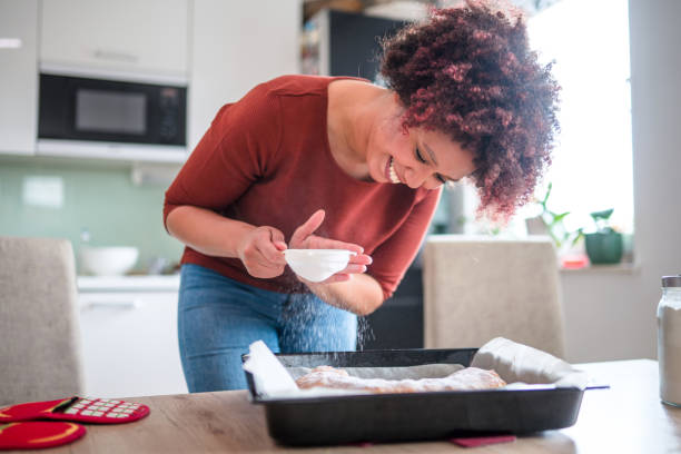 Beautiful Mixed Race Female Baking in a Domestic Kitchen