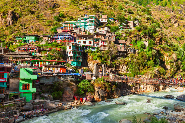 Colorful local houses in Manikaran, India Colorful local houses in Manikaran village in Parvati valley, Himachal Pradesh state in India lahaul and spiti district photos stock pictures, royalty-free photos & images
