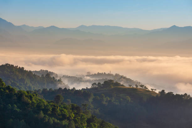 istock Himalaya hills in mist, sunrise landscape 1322194630