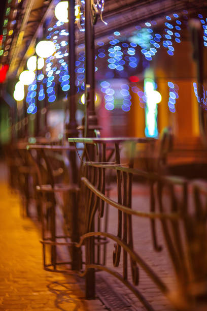 istock Fences and blurred night lights decorations of the bar on background. 1322196086