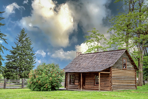 Ethel, WA. USA - 05-27-2021: Historic Jackson House Log Cabin in Washington State