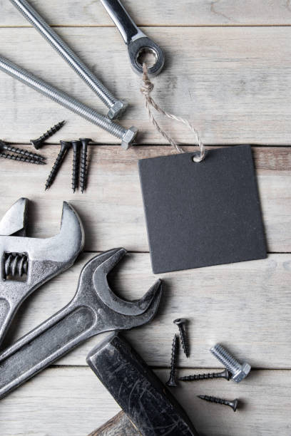 istock International Father's Day. Greeting card. Work tools on a gray wooden background 1322203730