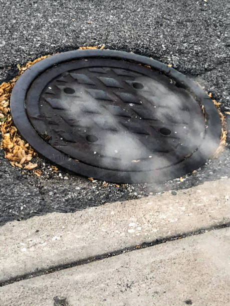 Smoking manhole cover in the streets of New York City.