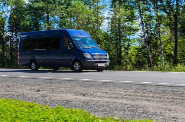 istock Minibus goes on the country highway 1322205790