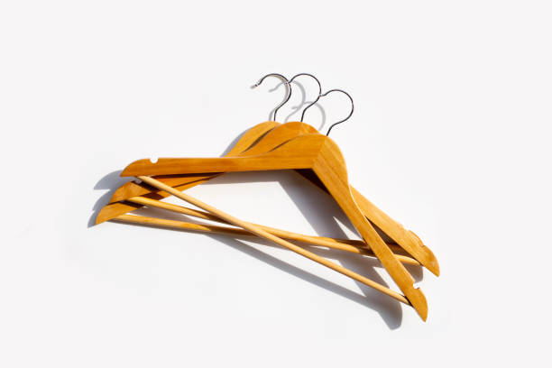 istock Wooden clothes hangers on white background 1322206575