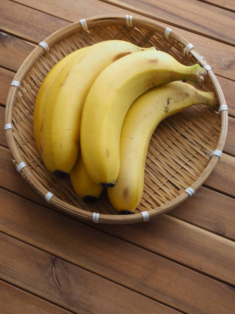 istock Yellow bananas in a basket, Tropical fruit 1322239002
