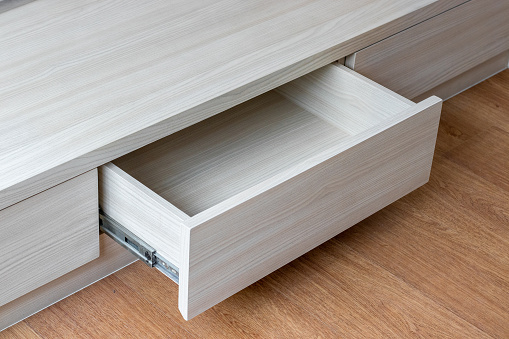 close up of bed drawers
