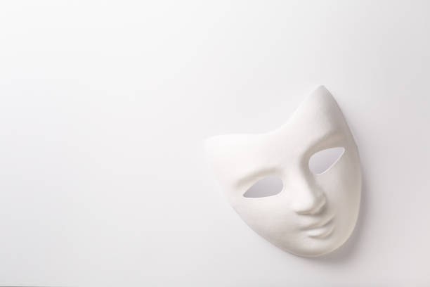 istock Theater or carnival concept - white mask on white background with copy space 1322246740