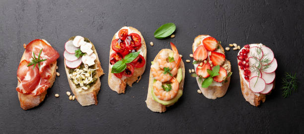 istock Appetizers board with traditional spanish tapas set. Italian antipasti snacks 1322255816