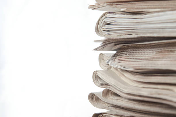 istock Stack of newspaper, close-up. Journalism concept 1322256448