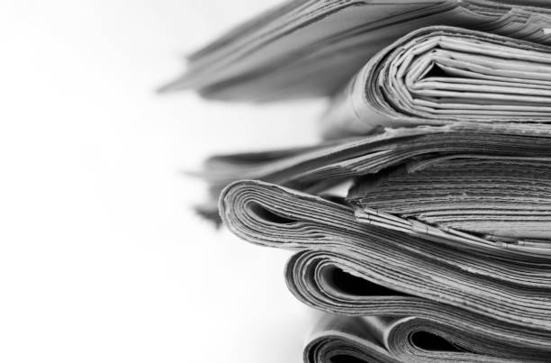 istock Stack of newspaper, close-up. Journalism concept 1322256449