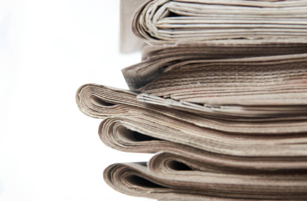 istock Stack of newspaper, close-up. Journalism concept 1322256452