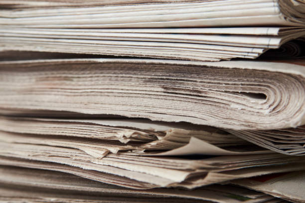 istock Stack of newspaper, close-up. Journalism concept 1322256455